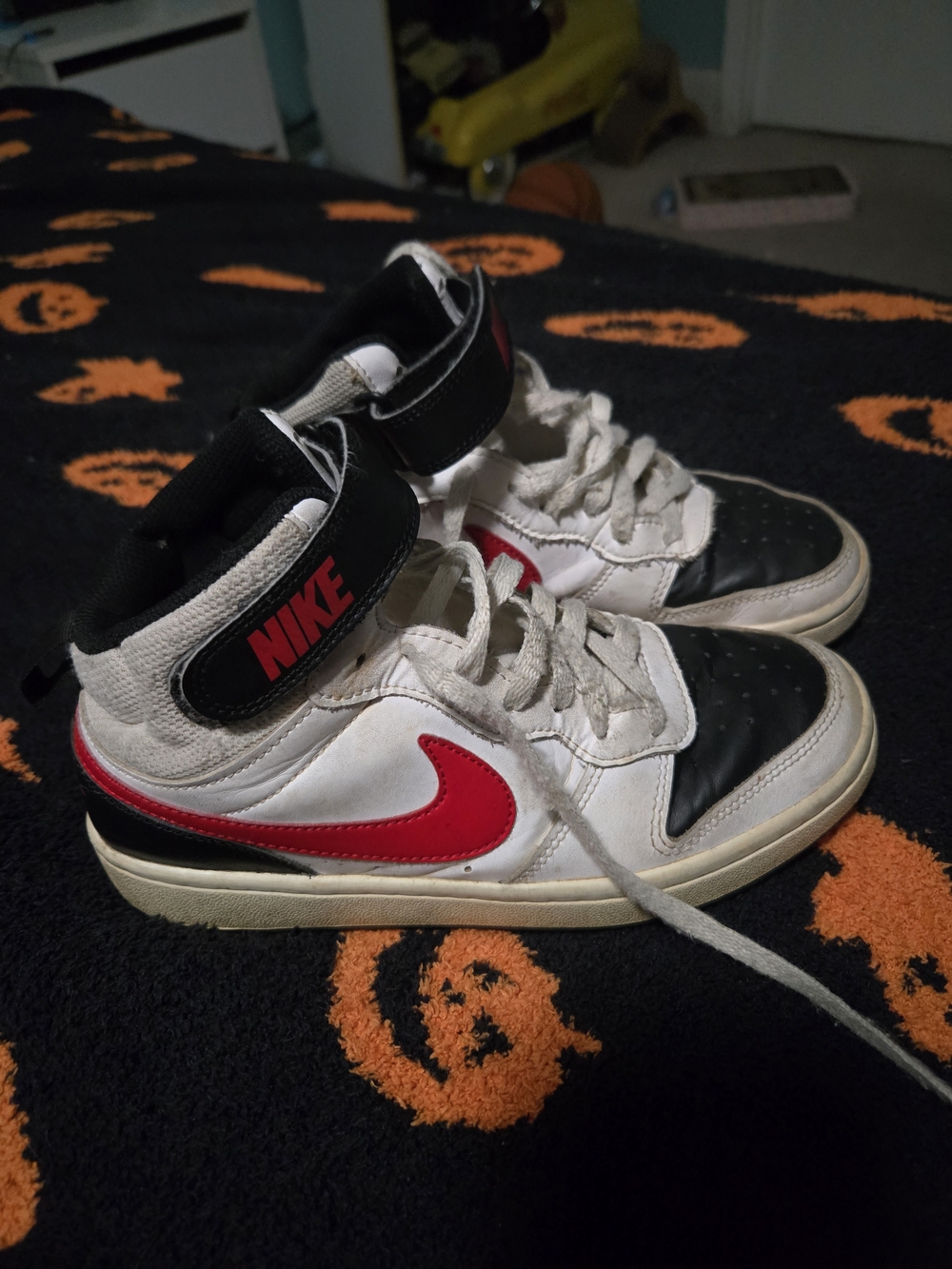 Nike Red Swoosh Black & White Mid-Top Sneakers
